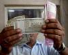 The rupee falls 5 paise to close at 83.50 against the US dollar